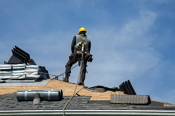 Professional Roofing technician working in Milroy, PA